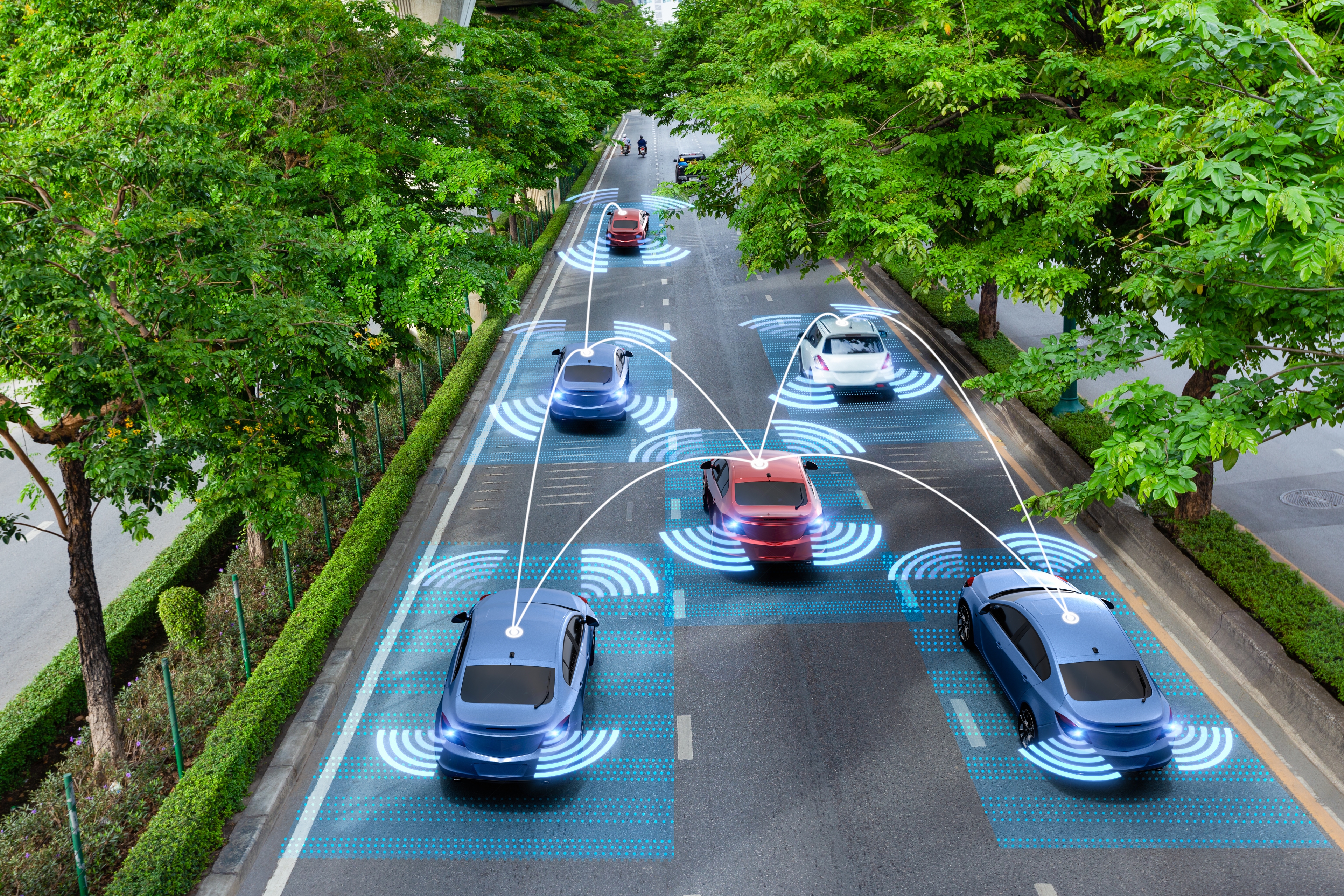 Connected cars with automated driving sensors on a road
